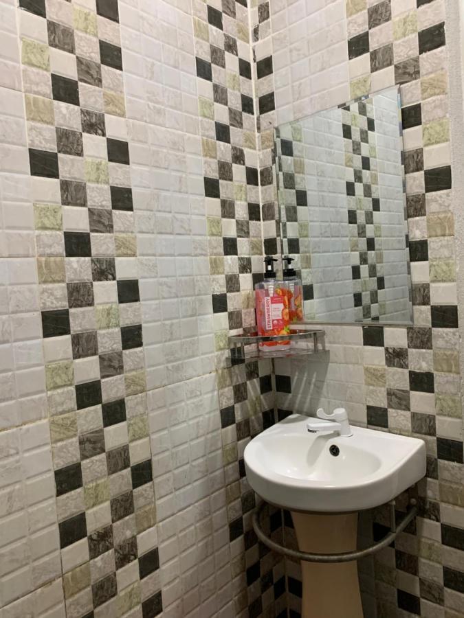 Aina Guest House Кота-Бару Экстерьер фото